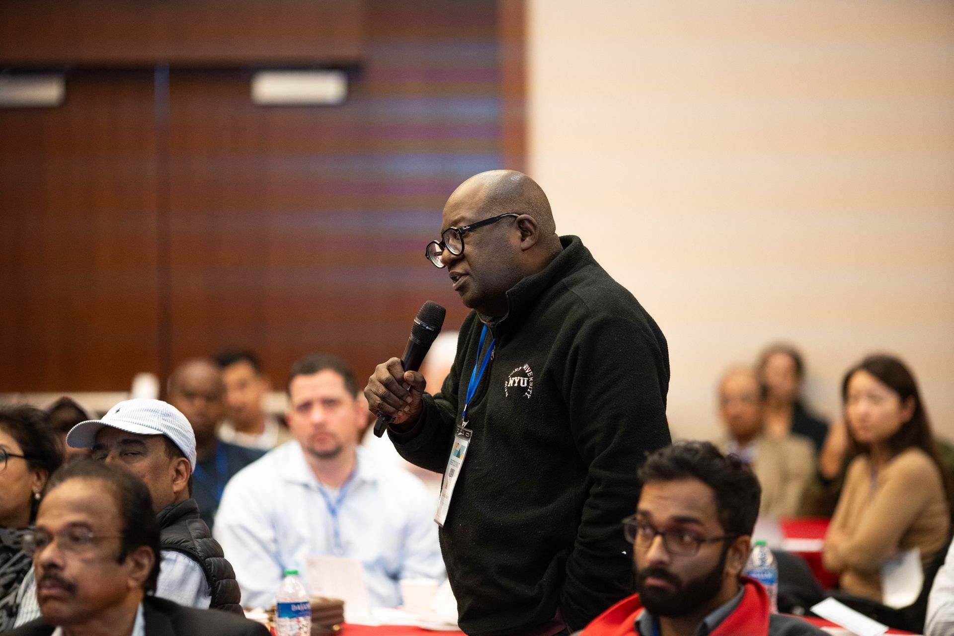 Attendee asking a question from the floor